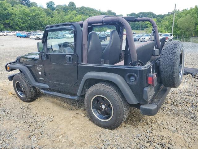 Photo 1 VIN: 1J4FA49S5YP704582 - JEEP WRANGLER 