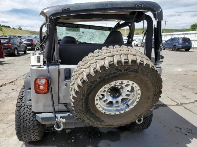 Photo 5 VIN: 1J4FA49S6YP703506 - JEEP WRANGLER 