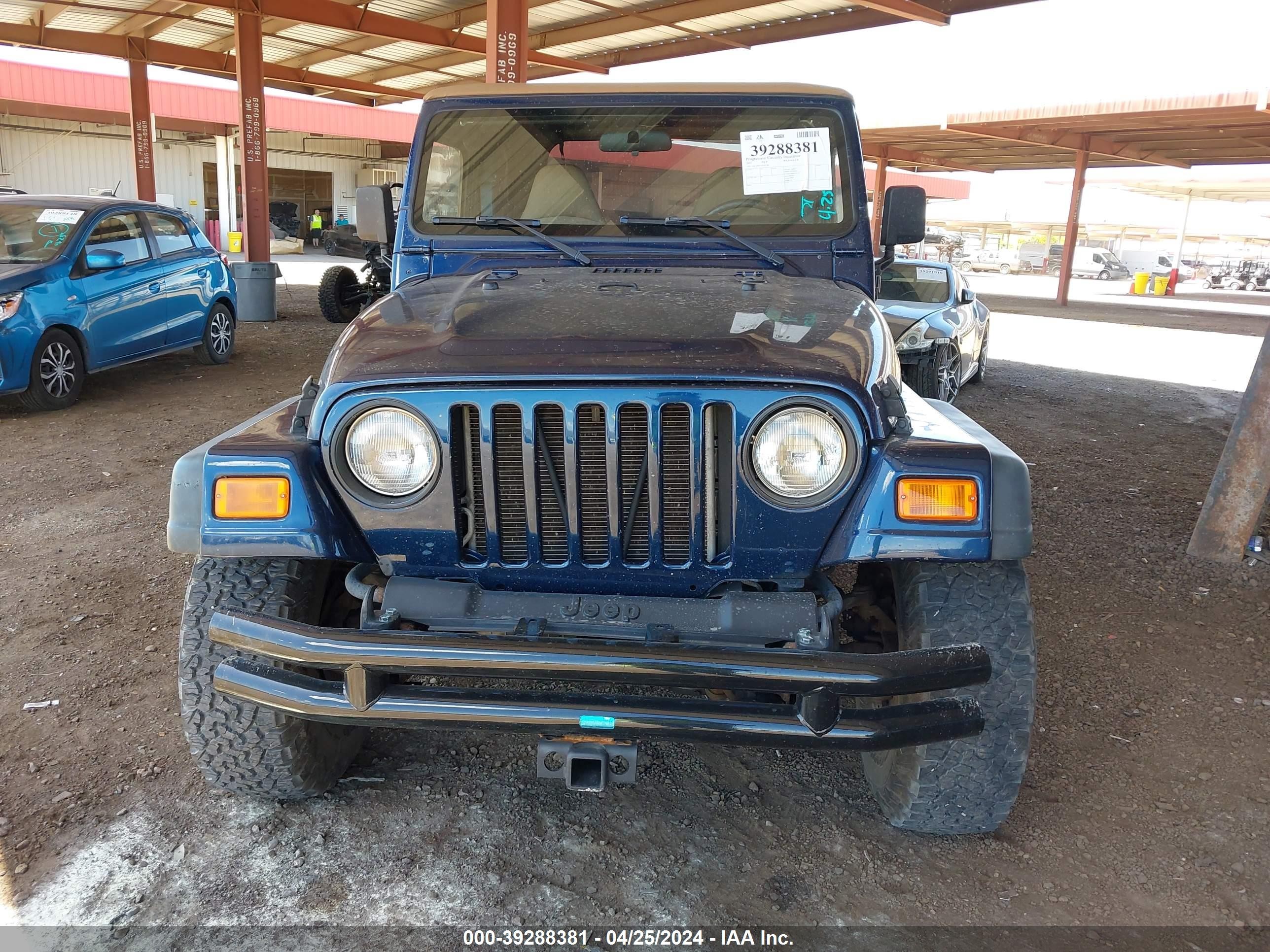 Photo 11 VIN: 1J4FA49S71P302164 - JEEP WRANGLER 