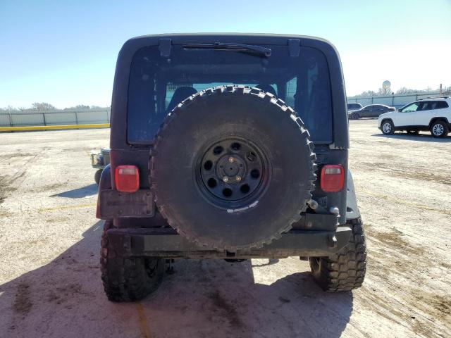 Photo 5 VIN: 1J4FA49S7YP788596 - JEEP WRANGLER 