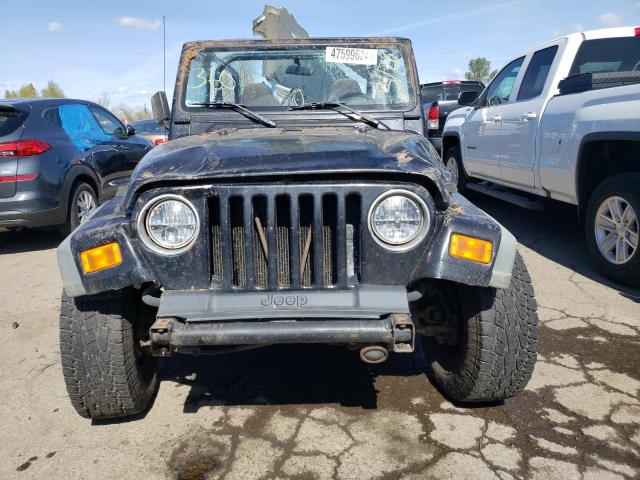 Photo 4 VIN: 1J4FA49S7YP796620 - JEEP WRANGLER 