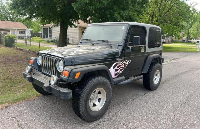 Photo 1 VIN: 1J4FA49S8YP792060 - JEEP WRANGLER 