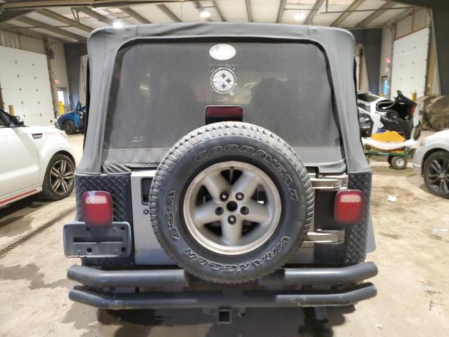 Photo 5 VIN: 1J4FA49S8YP795654 - JEEP WRANGLER 