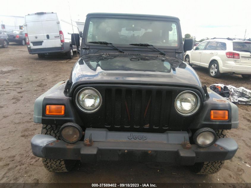 Photo 5 VIN: 1J4FA49S92P736569 - JEEP WRANGLER 