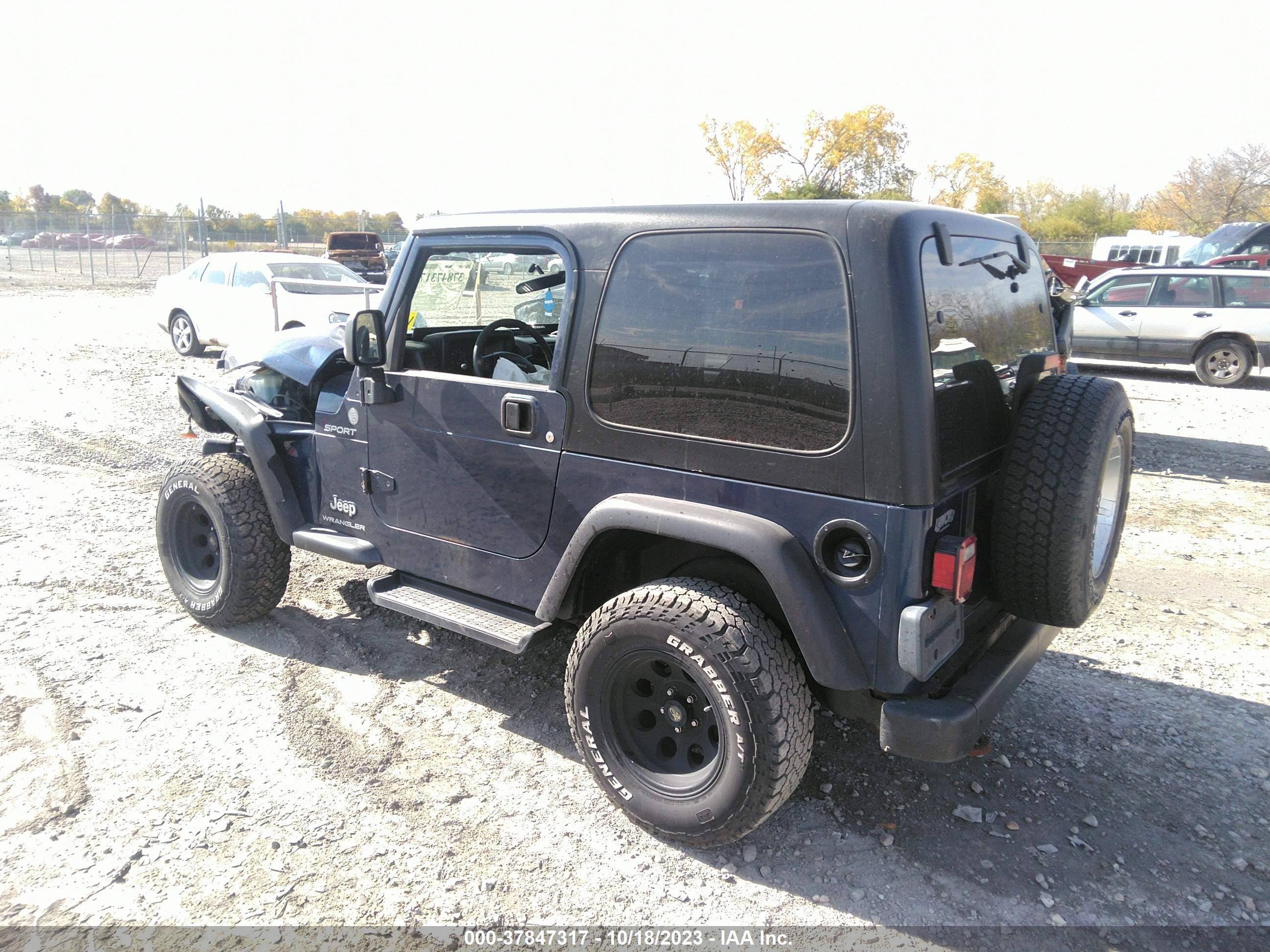 Photo 2 VIN: 1J4FA49S94P800970 - JEEP WRANGLER 