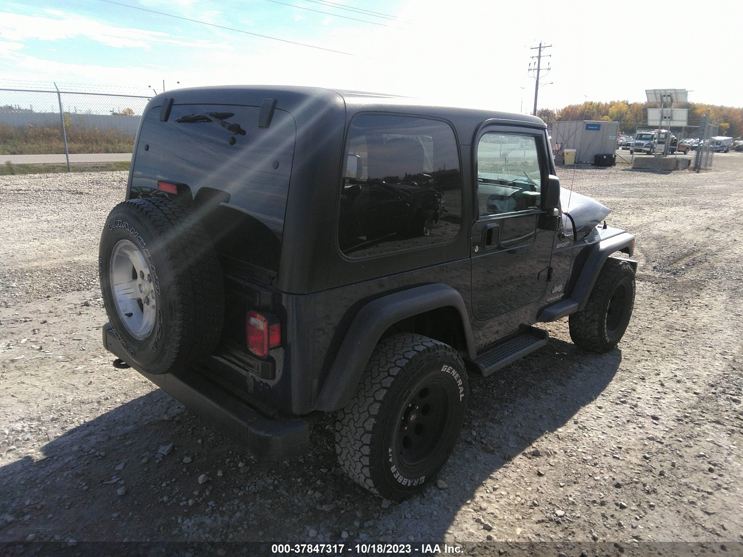 Photo 3 VIN: 1J4FA49S94P800970 - JEEP WRANGLER 