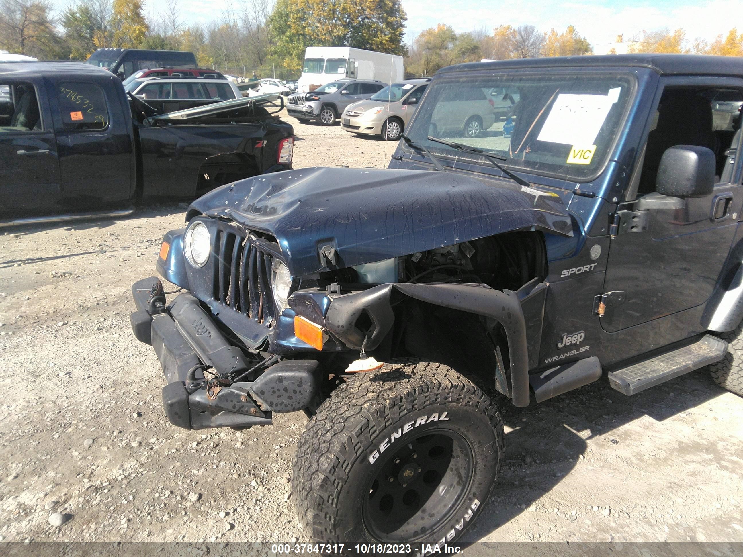 Photo 5 VIN: 1J4FA49S94P800970 - JEEP WRANGLER 