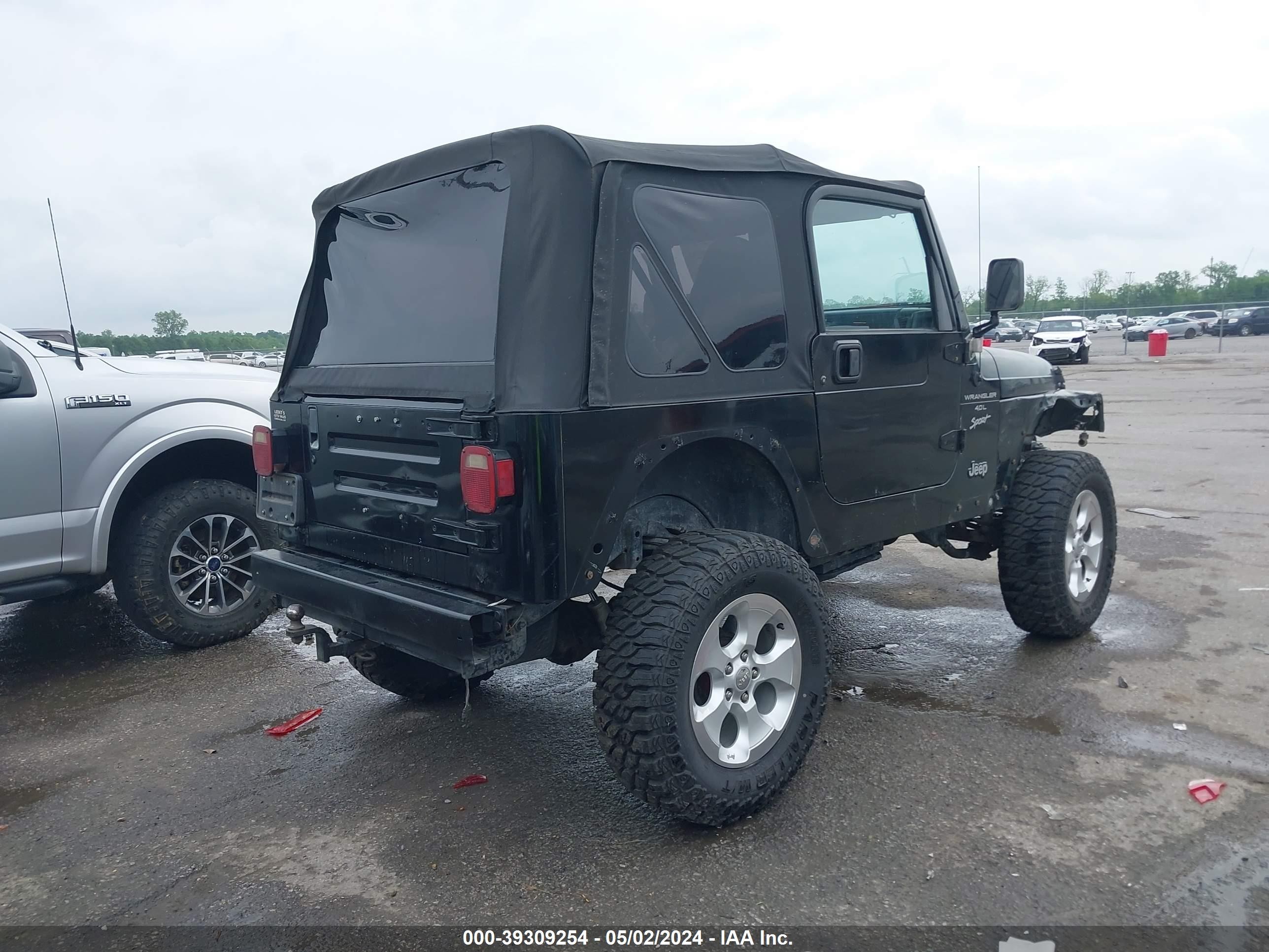 Photo 3 VIN: 1J4FA49S9YP707288 - JEEP WRANGLER 