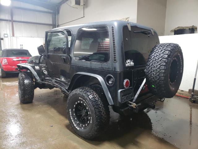 Photo 1 VIN: 1J4FA49SXYP726268 - JEEP WRANGLER 