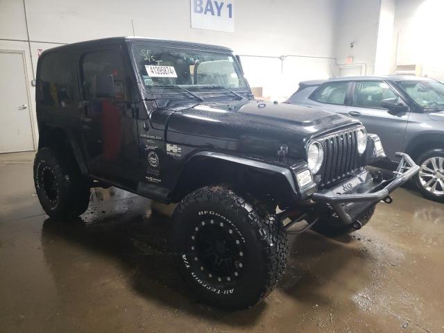 Photo 3 VIN: 1J4FA49SXYP726268 - JEEP WRANGLER 