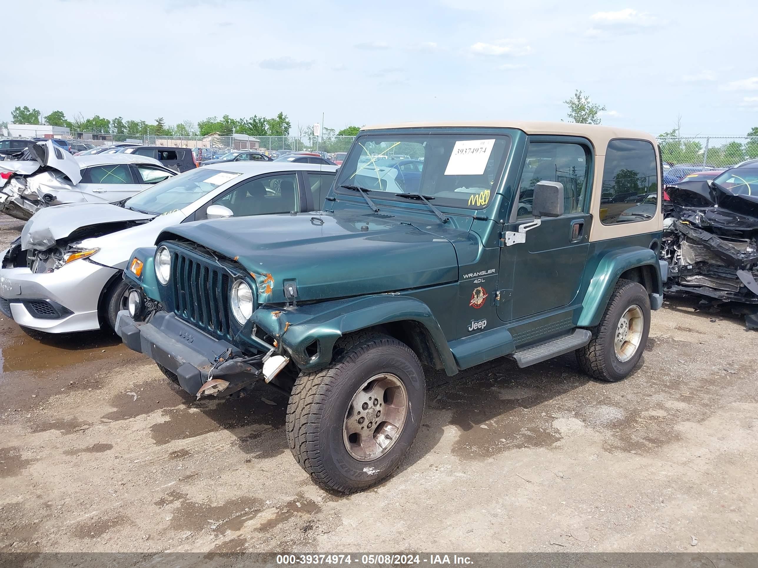 Photo 1 VIN: 1J4FA59S0YP723028 - JEEP WRANGLER 