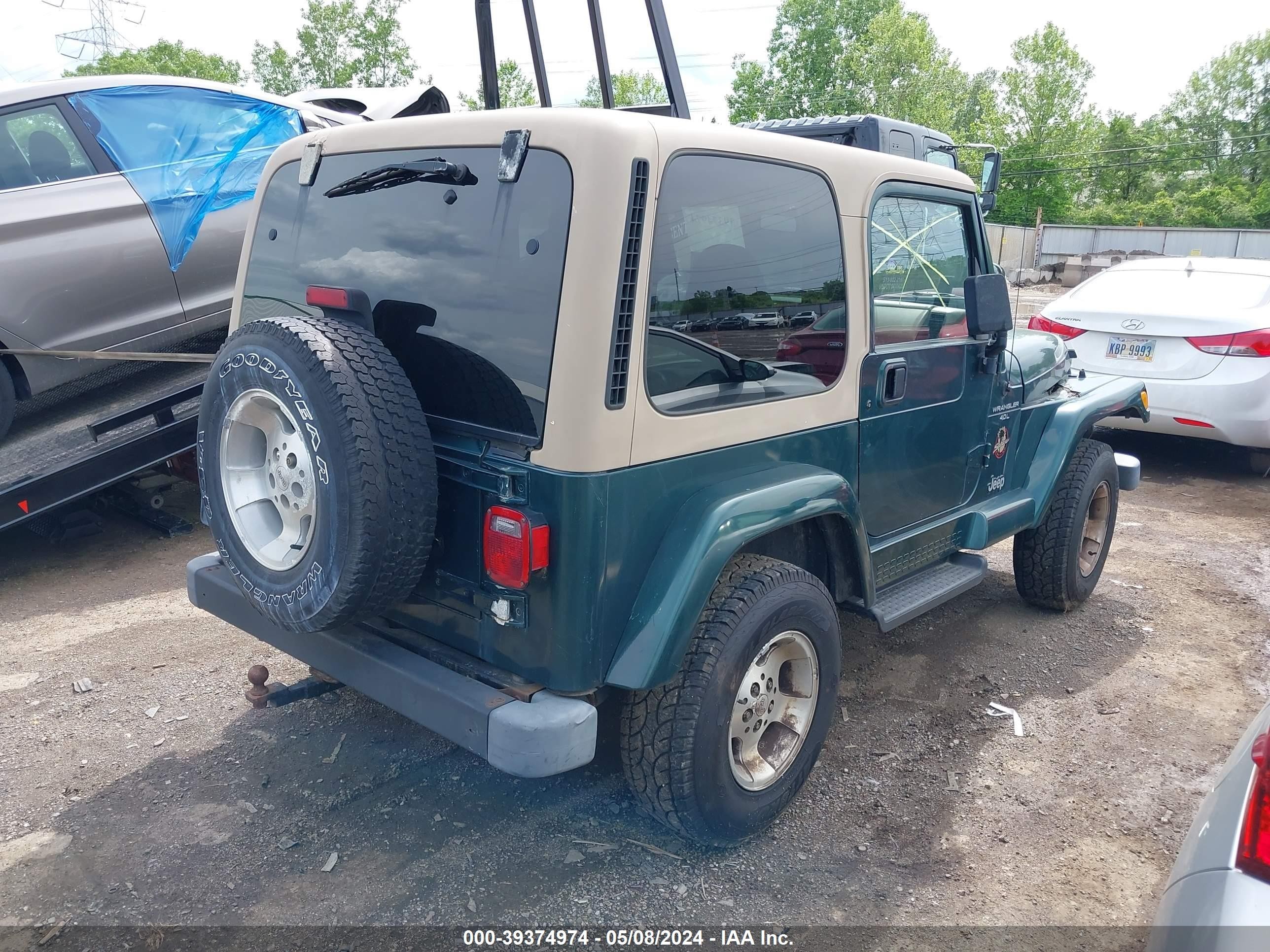 Photo 3 VIN: 1J4FA59S0YP723028 - JEEP WRANGLER 