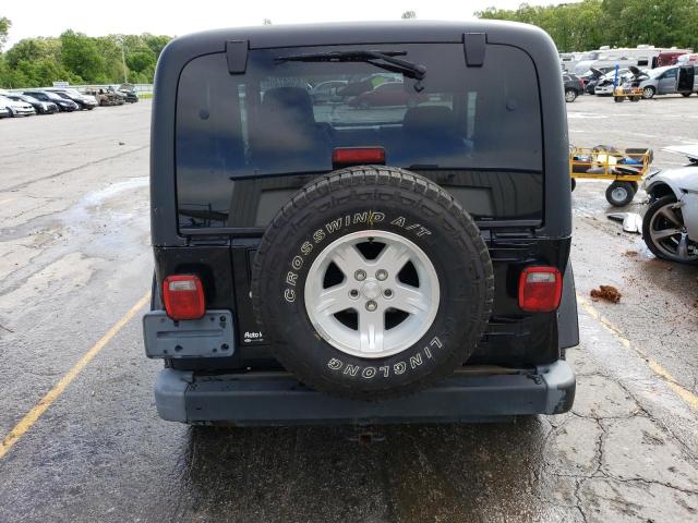 Photo 5 VIN: 1J4FA59S14P730855 - JEEP WRANGLER 