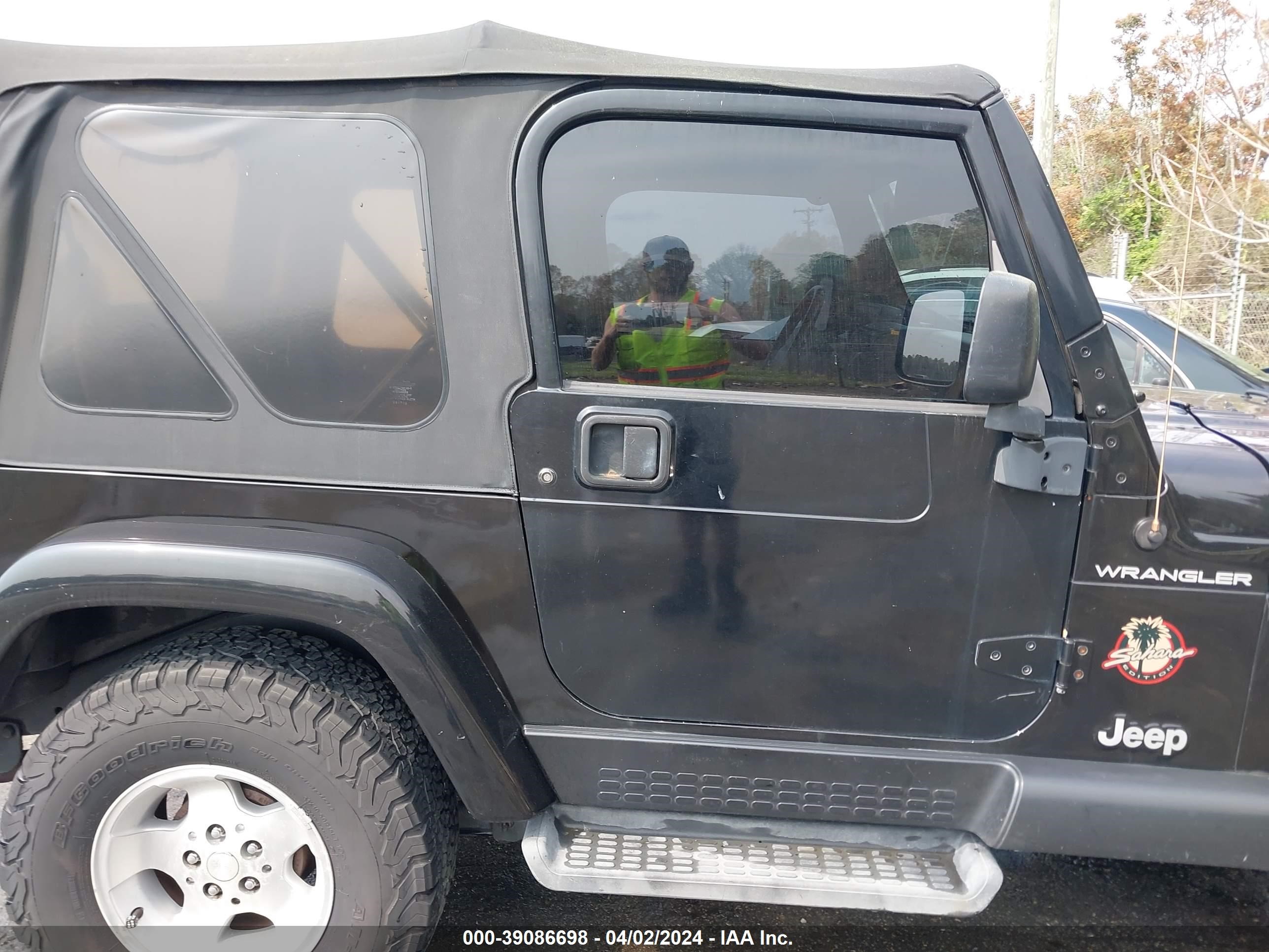 Photo 12 VIN: 1J4FA59S42P725209 - JEEP WRANGLER 