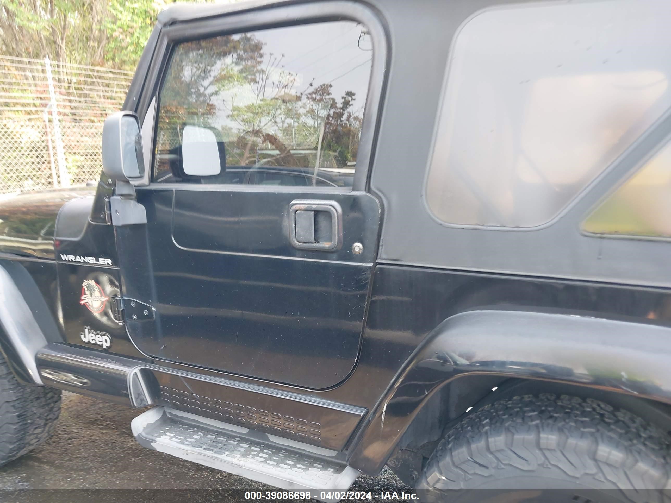 Photo 13 VIN: 1J4FA59S42P725209 - JEEP WRANGLER 