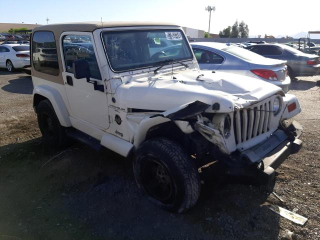 Photo 3 VIN: 1J4FA59S4YP747879 - JEEP WRANGLER 