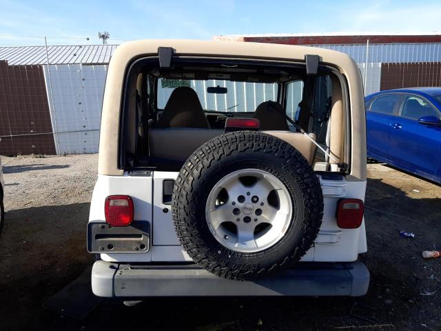 Photo 5 VIN: 1J4FA59S4YP747879 - JEEP WRANGLER 