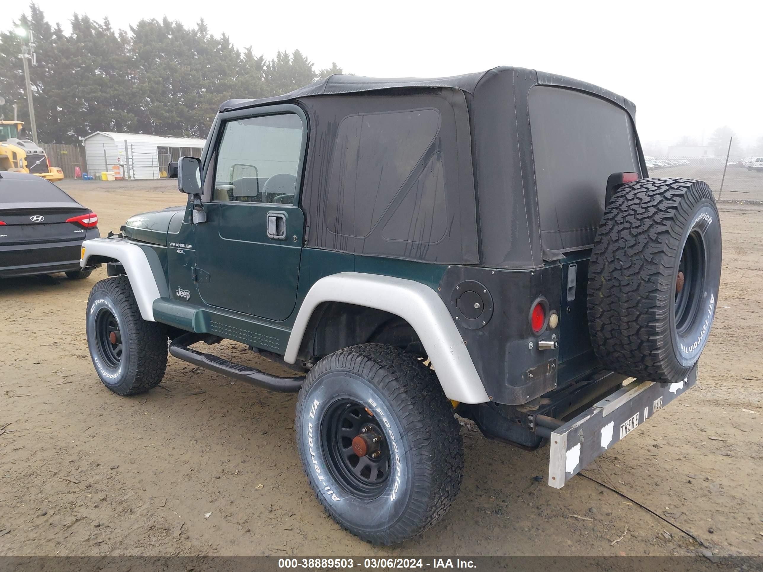 Photo 2 VIN: 1J4FA59S7YP750730 - JEEP WRANGLER 