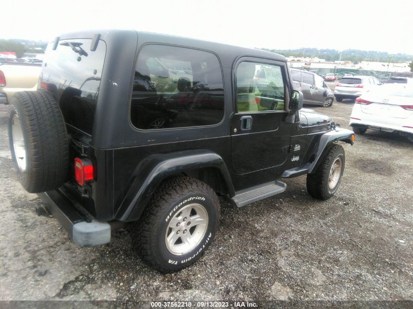 Photo 3 VIN: 1J4FA59S84P717410 - JEEP WRANGLER 