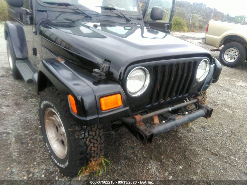 Photo 5 VIN: 1J4FA59S84P717410 - JEEP WRANGLER 