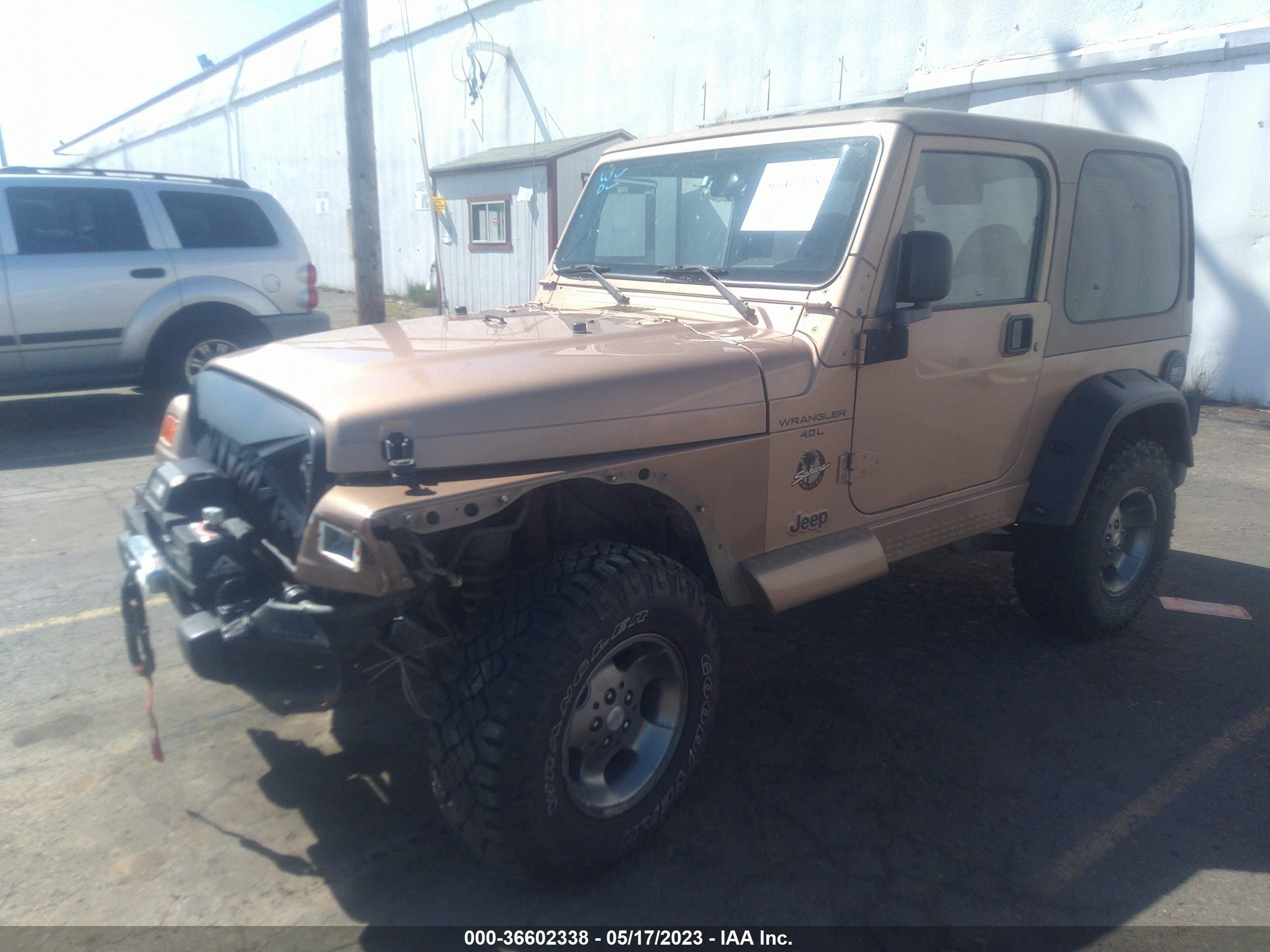 Photo 1 VIN: 1J4FA59SXYP770485 - JEEP WRANGLER 