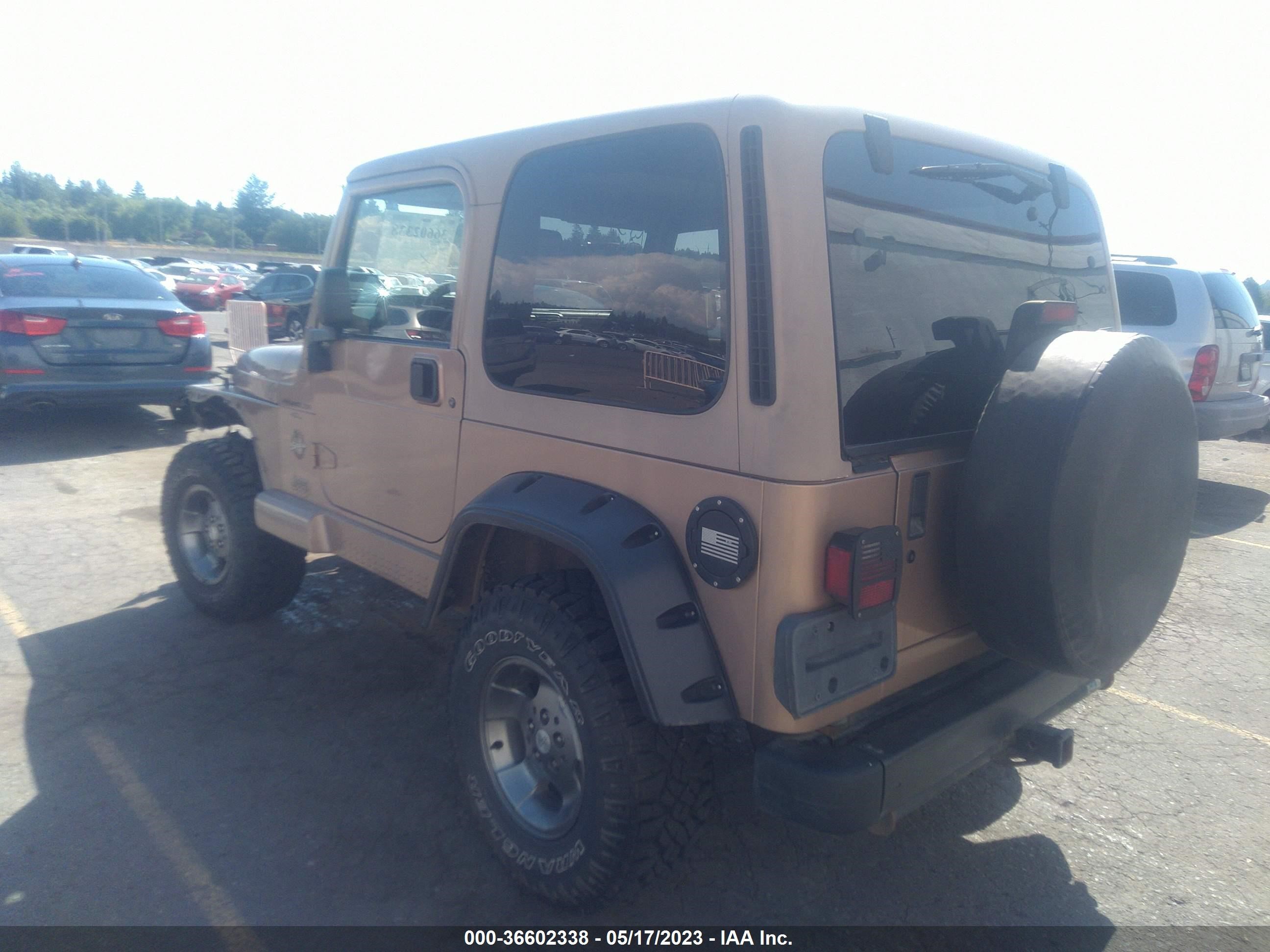 Photo 2 VIN: 1J4FA59SXYP770485 - JEEP WRANGLER 