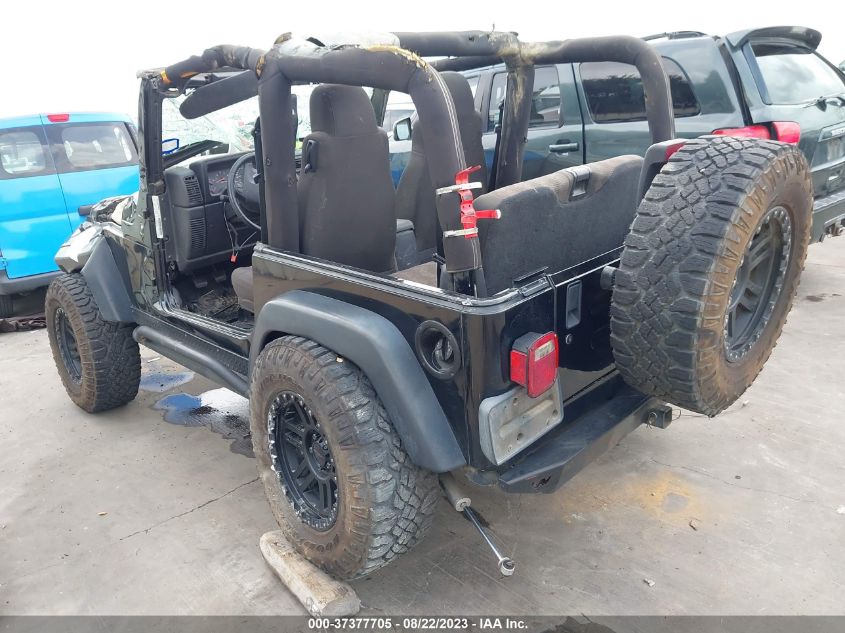 Photo 2 VIN: 1J4FA69S54P736891 - JEEP WRANGLER 