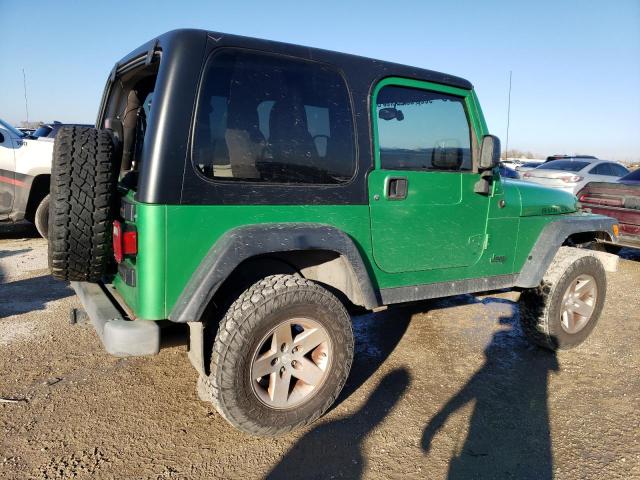 Photo 2 VIN: 1J4FA69SX4P791420 - JEEP WRANGLER 