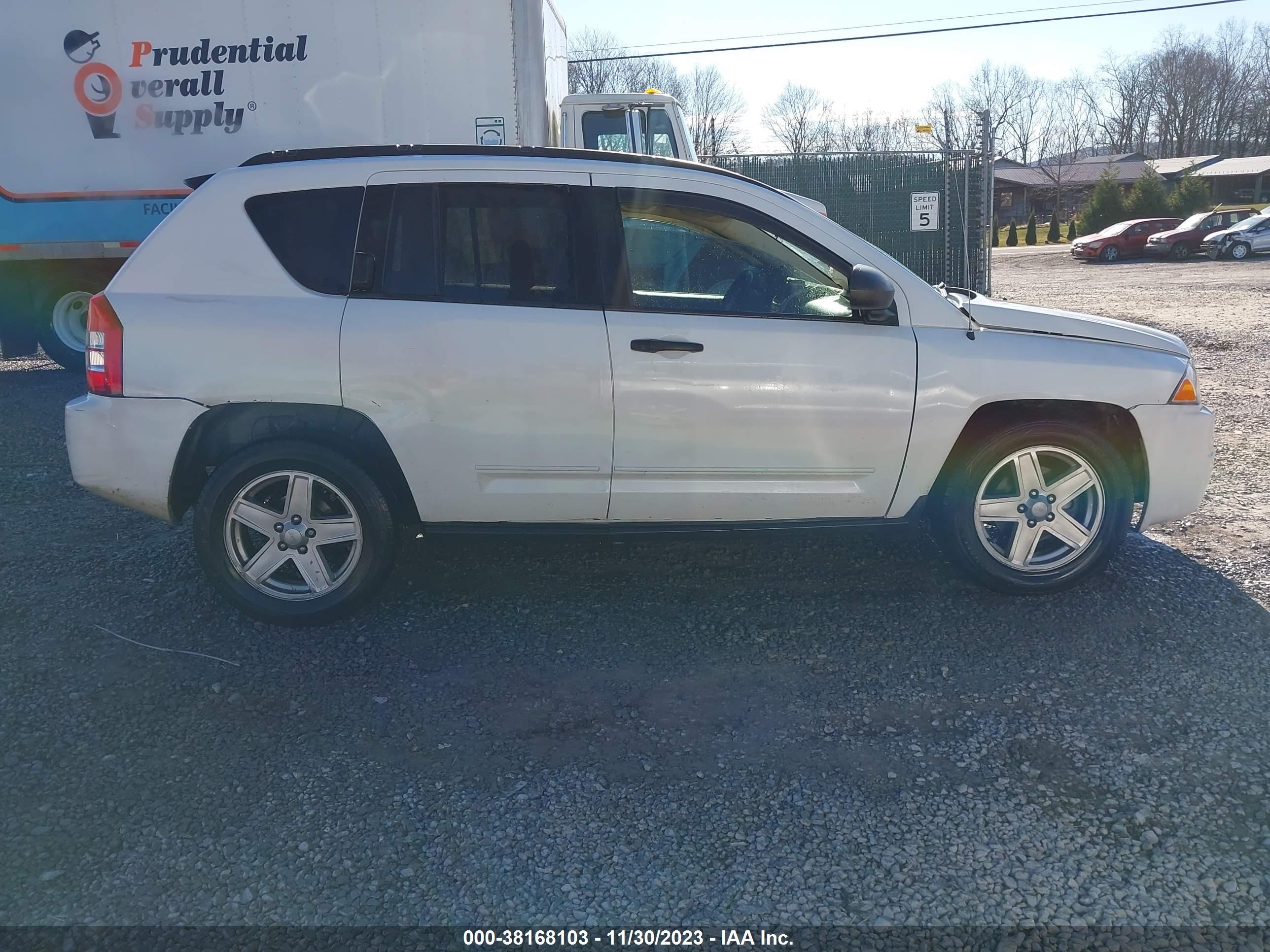 Photo 13 VIN: 1J4FF47B09D120825 - JEEP COMPASS 