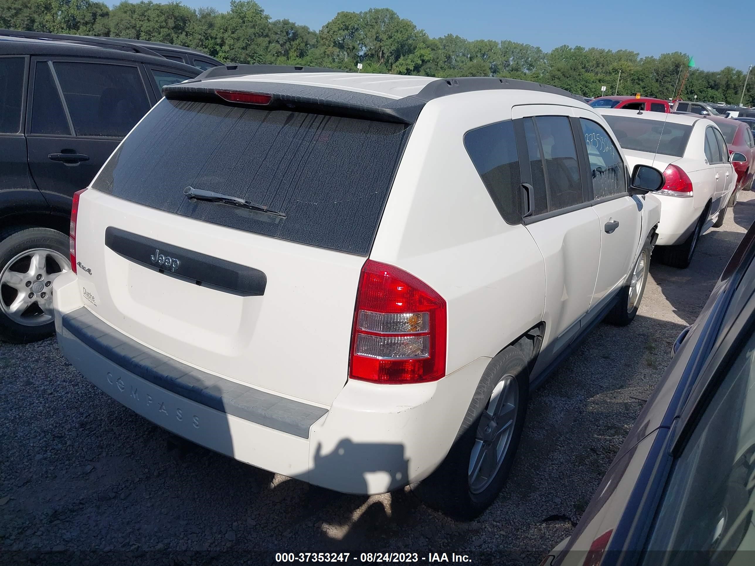 Photo 3 VIN: 1J4FF47B79D137296 - JEEP COMPASS 