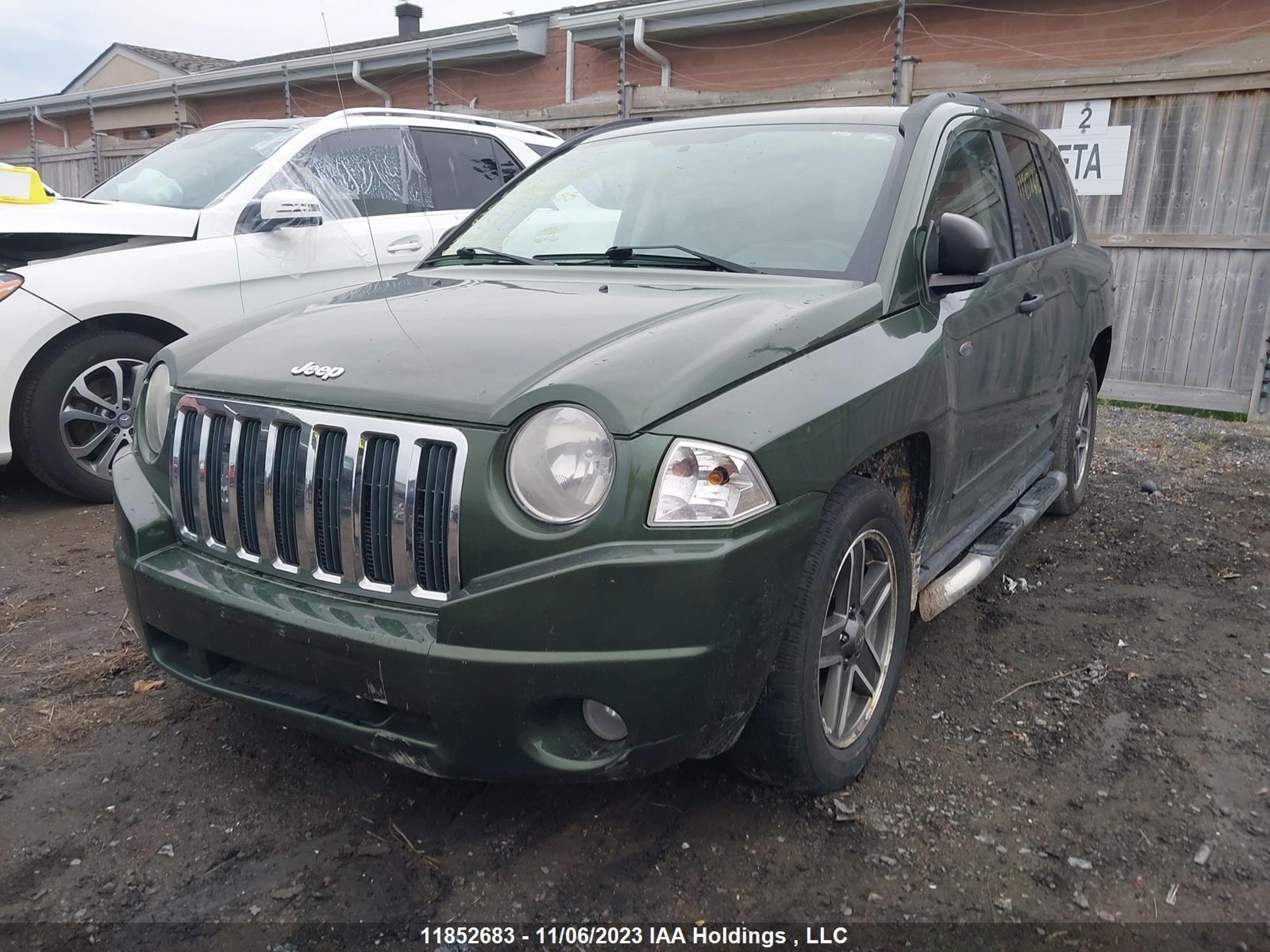 Photo 5 VIN: 1J4FF47BX9D188050 - JEEP COMPASS 