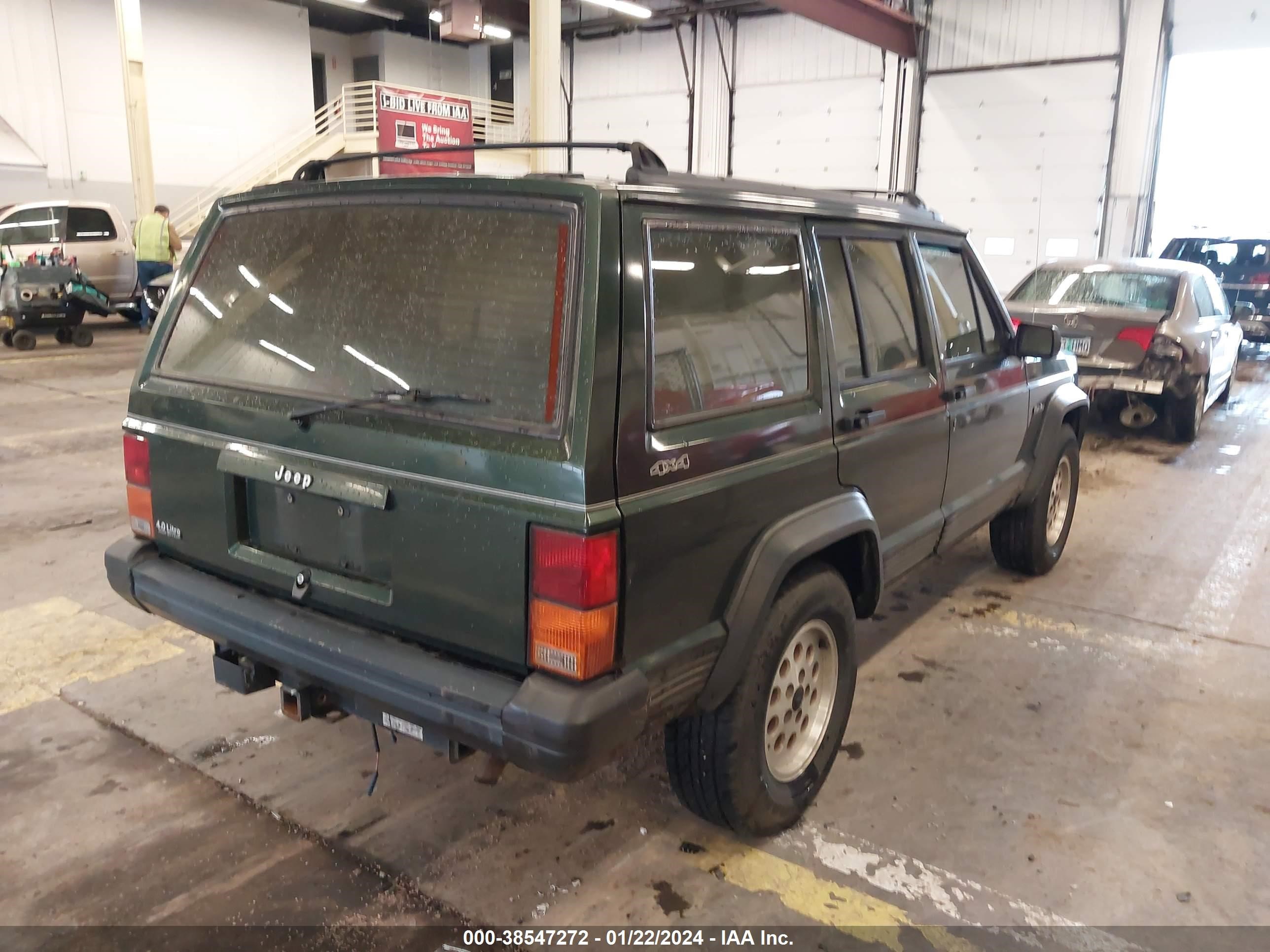 Photo 3 VIN: 1J4FJ28S9SL665306 - JEEP CHEROKEE 