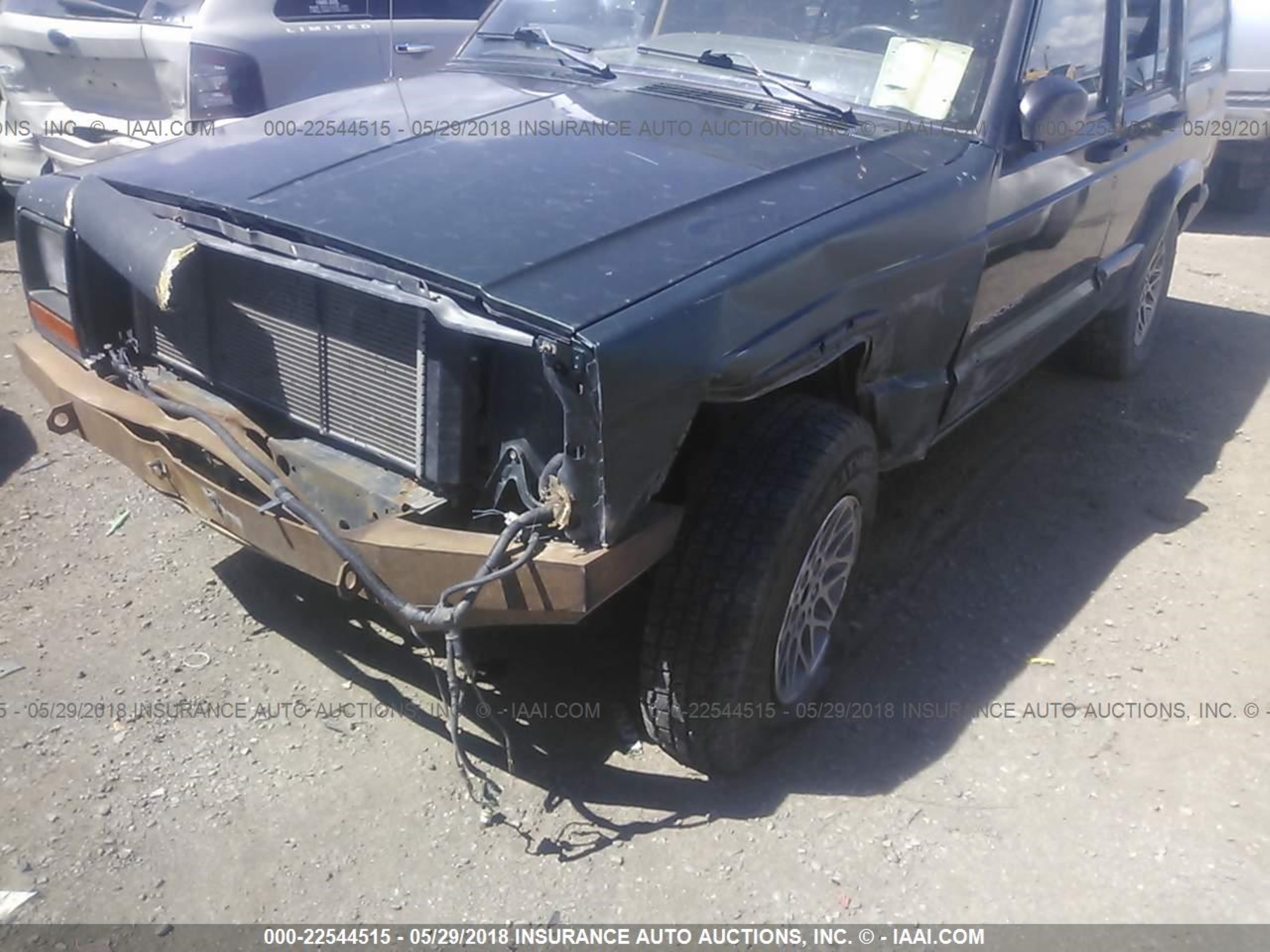 Photo 5 VIN: 1J4FJ78S3VL590930 - JEEP CHEROKEE 