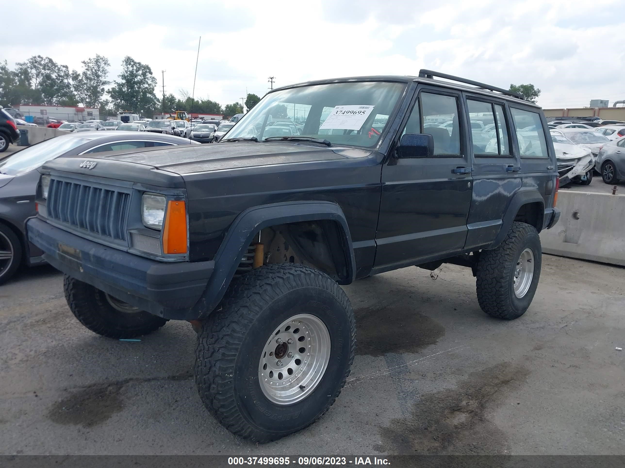 Photo 1 VIN: 1J4FJ8850NL144895 - JEEP CHEROKEE 