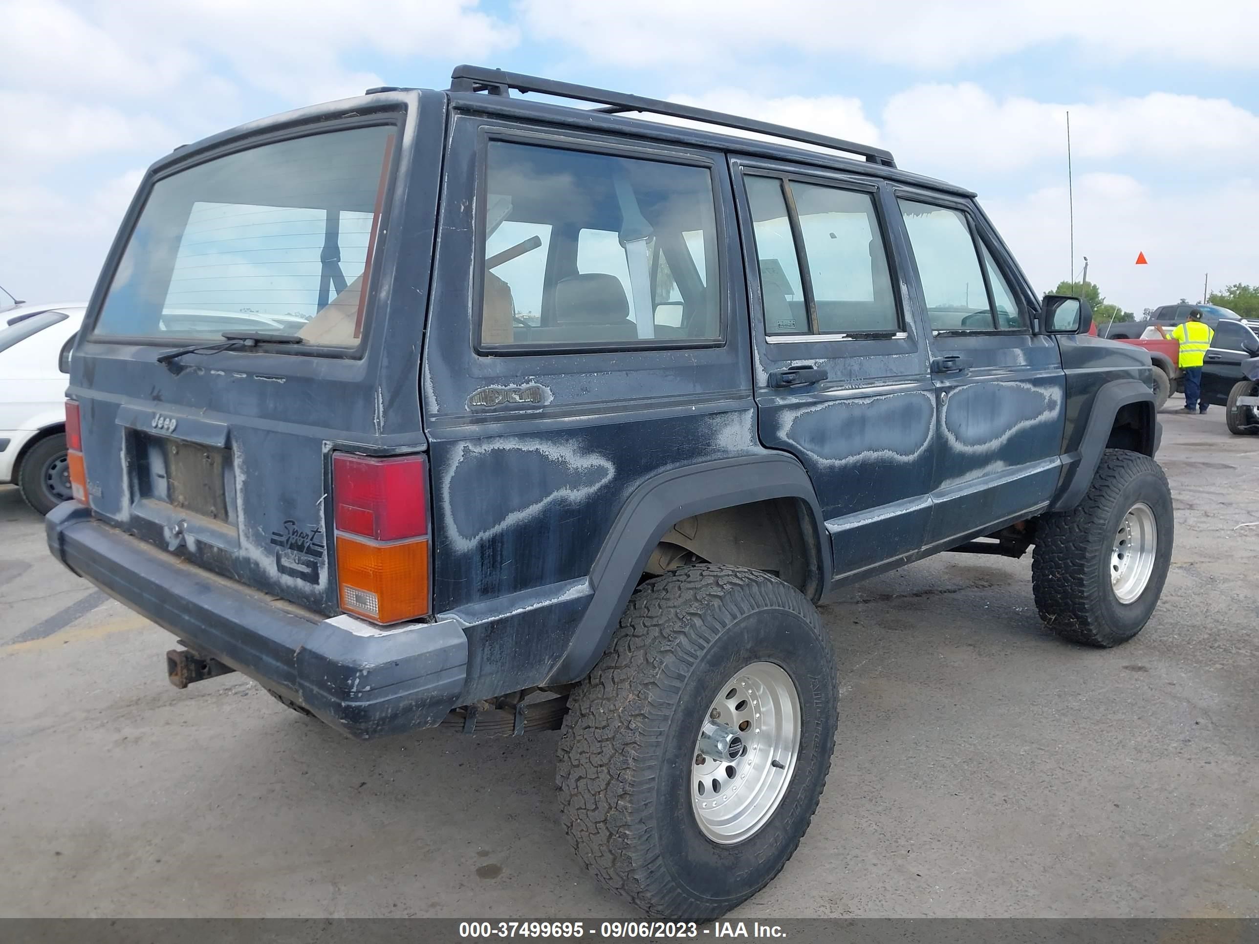 Photo 3 VIN: 1J4FJ8850NL144895 - JEEP CHEROKEE 