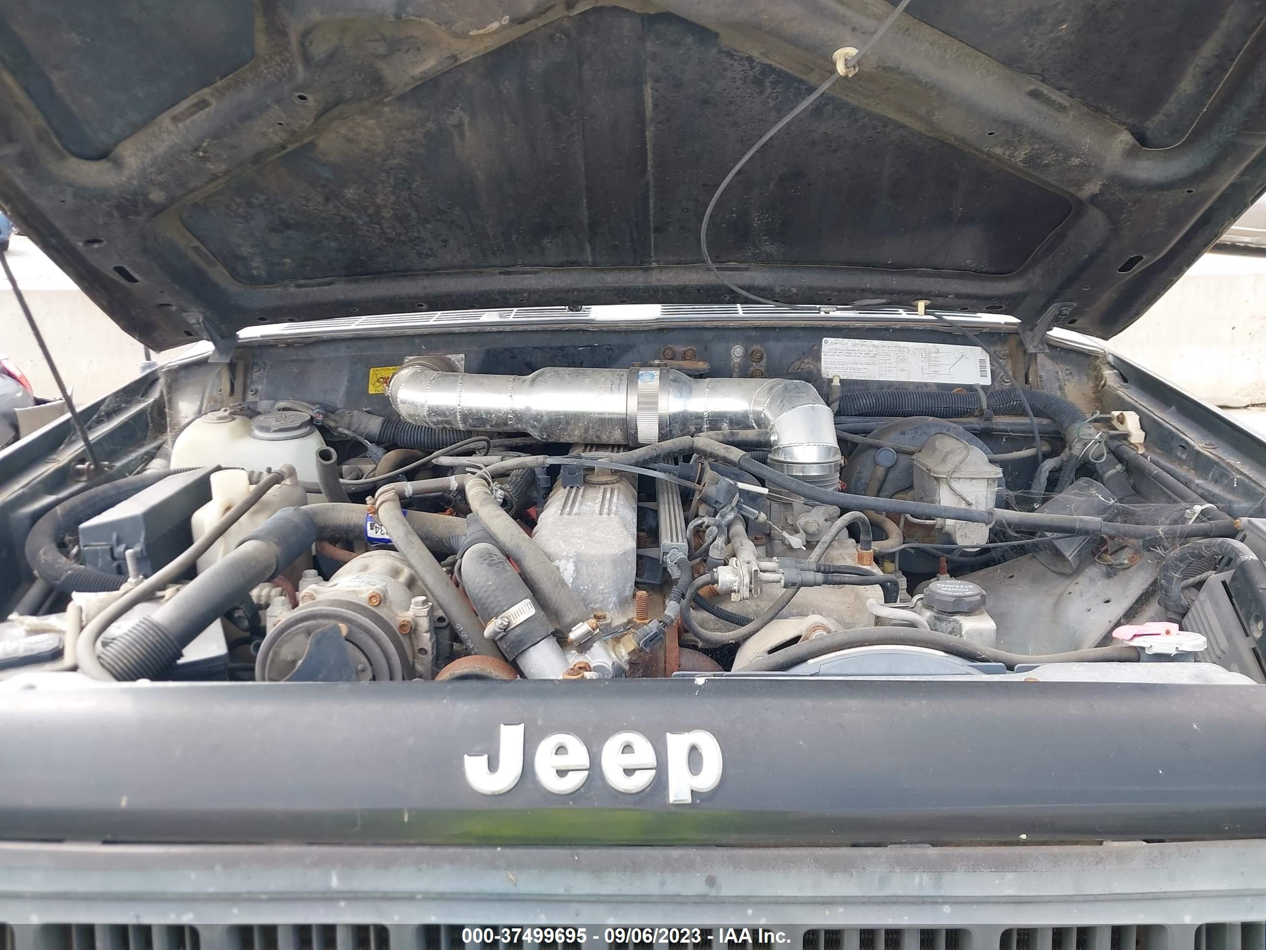 Photo 9 VIN: 1J4FJ8850NL144895 - JEEP CHEROKEE 