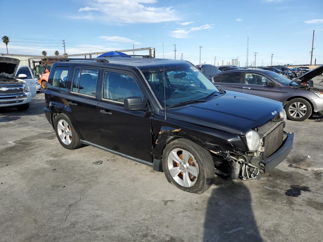 Photo 3 VIN: 1J4FT28A59D228893 - JEEP LIBERTY (PATRIOT) 