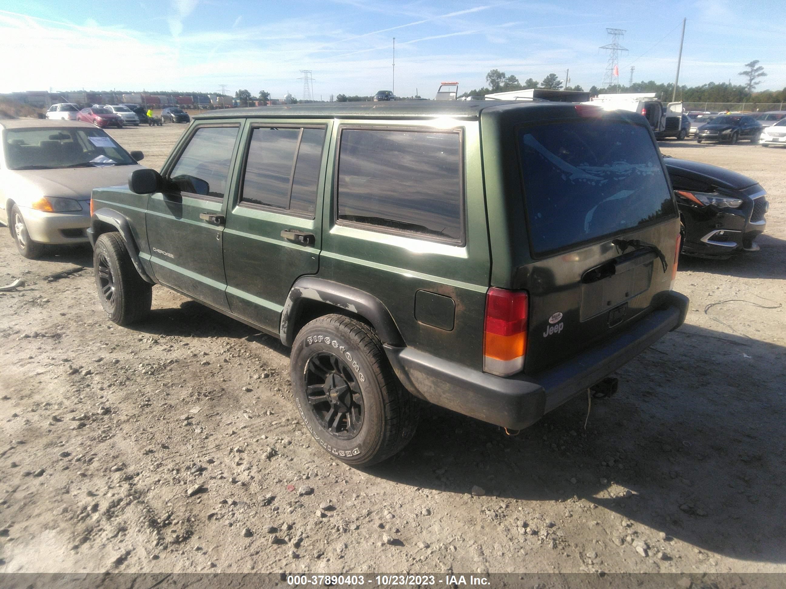 Photo 2 VIN: 1J4FT28S8VL525018 - JEEP CHEROKEE 