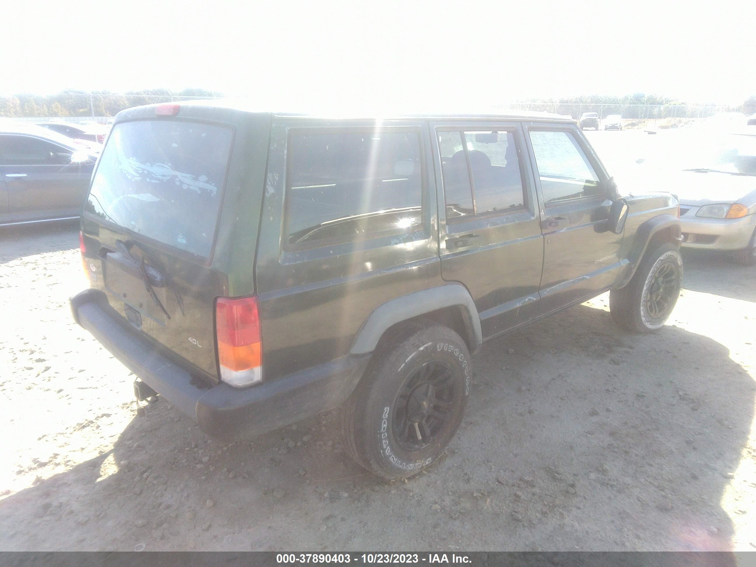 Photo 3 VIN: 1J4FT28S8VL525018 - JEEP CHEROKEE 