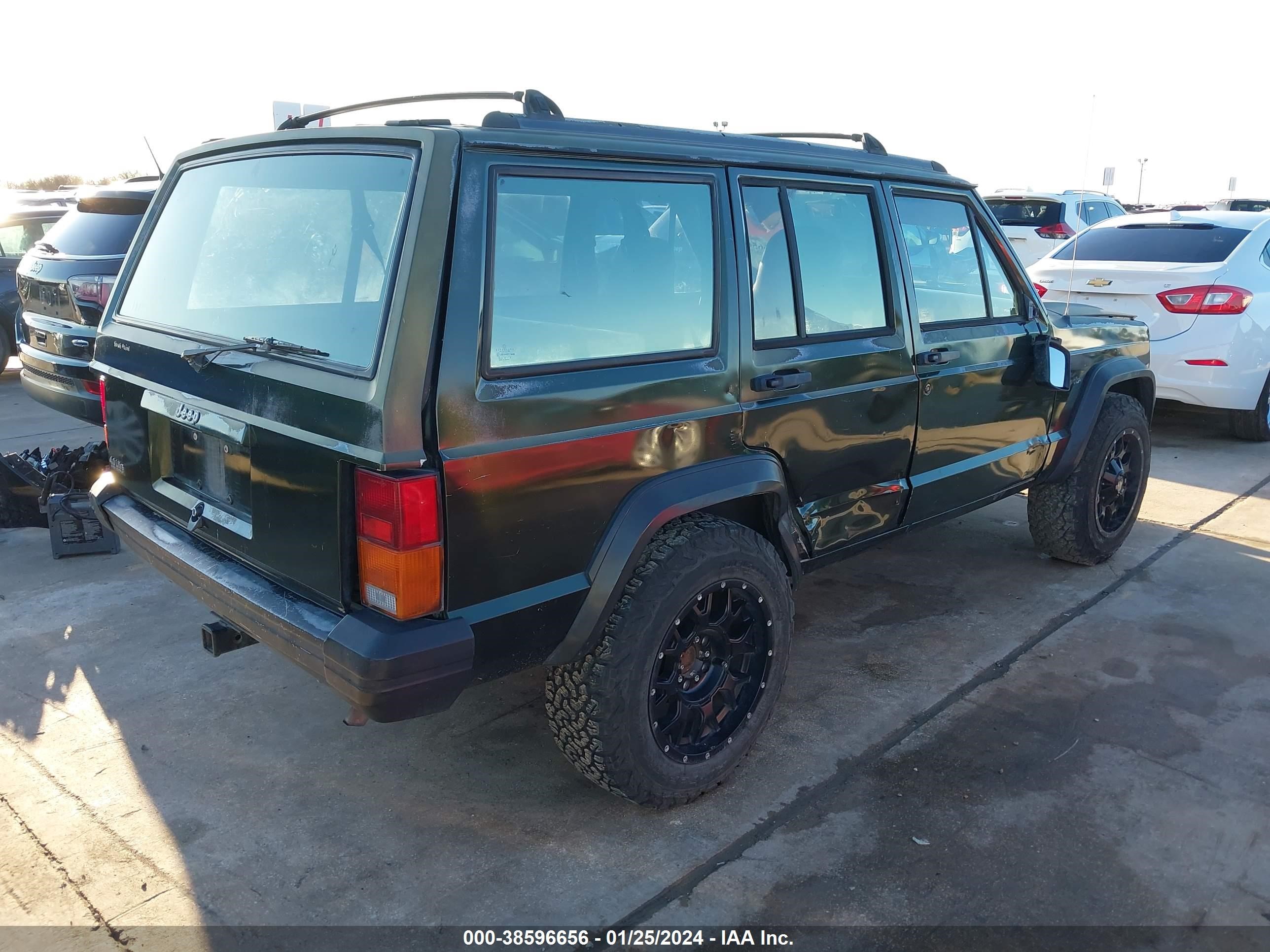 Photo 3 VIN: 1J4FT28S9SL589483 - JEEP CHEROKEE 