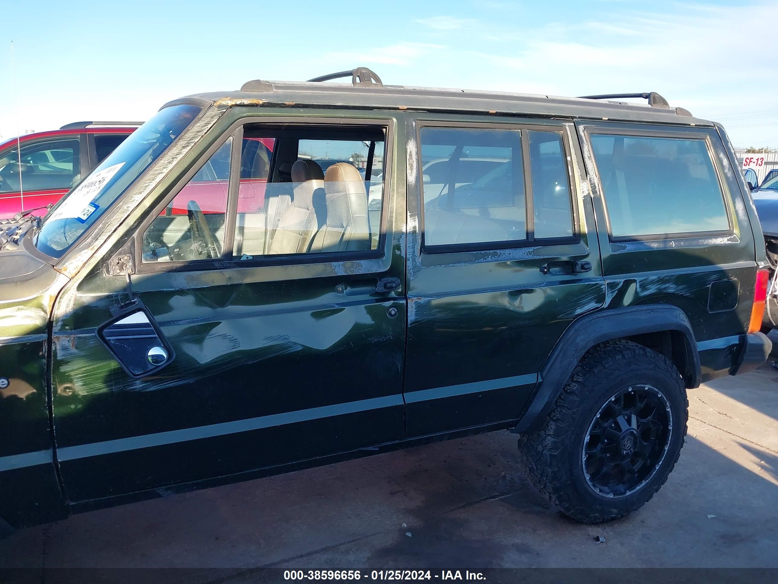 Photo 5 VIN: 1J4FT28S9SL589483 - JEEP CHEROKEE 