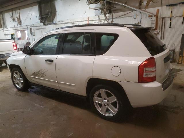 Photo 1 VIN: 1J4FT47A49D128619 - JEEP COMPASS 