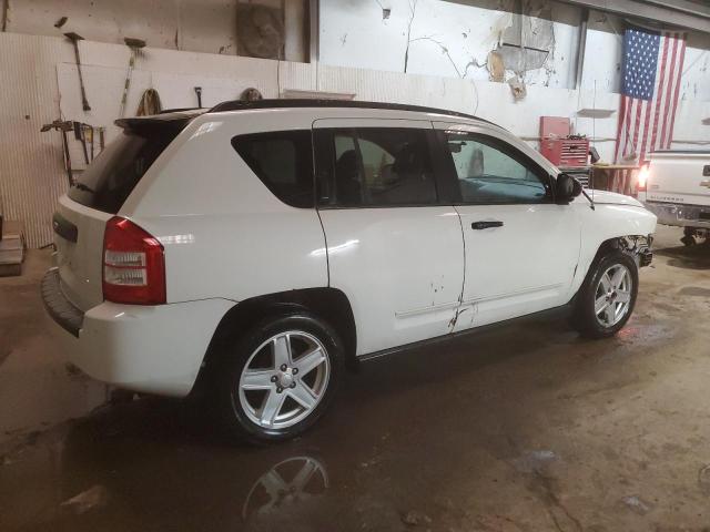 Photo 2 VIN: 1J4FT47A49D128619 - JEEP COMPASS 