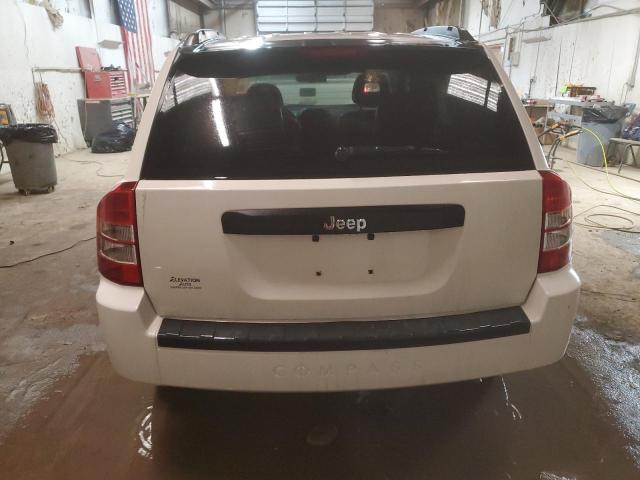 Photo 5 VIN: 1J4FT47A49D128619 - JEEP COMPASS 