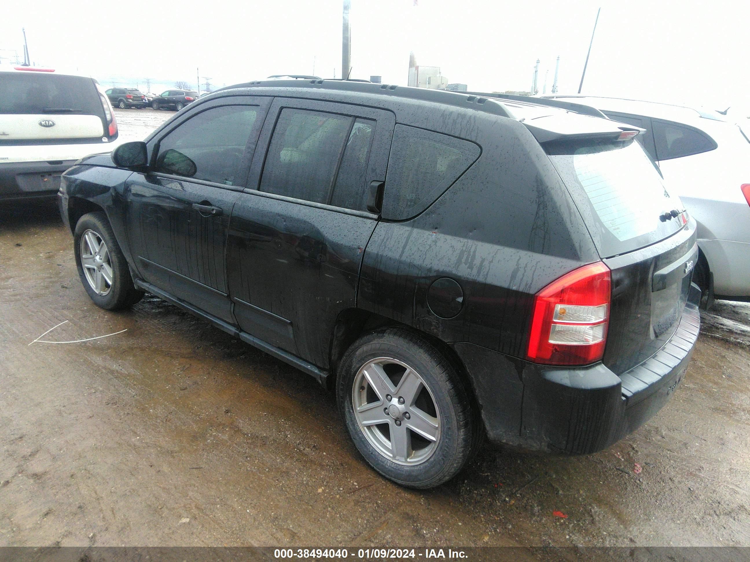 Photo 2 VIN: 1J4FT47A89D234510 - JEEP COMPASS 