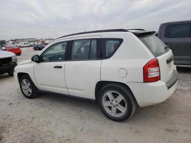 Photo 1 VIN: 1J4FT47A99D228411 - JEEP COMPASS 