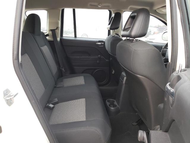 Photo 10 VIN: 1J4FT47A99D228411 - JEEP COMPASS 