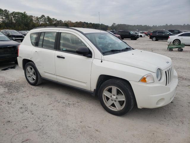 Photo 3 VIN: 1J4FT47A99D228411 - JEEP COMPASS 