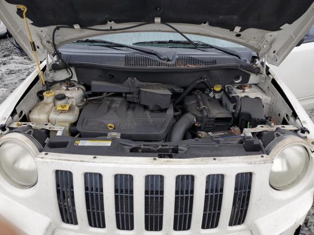 Photo 10 VIN: 1J4FT47B29D134394 - JEEP COMPASS 