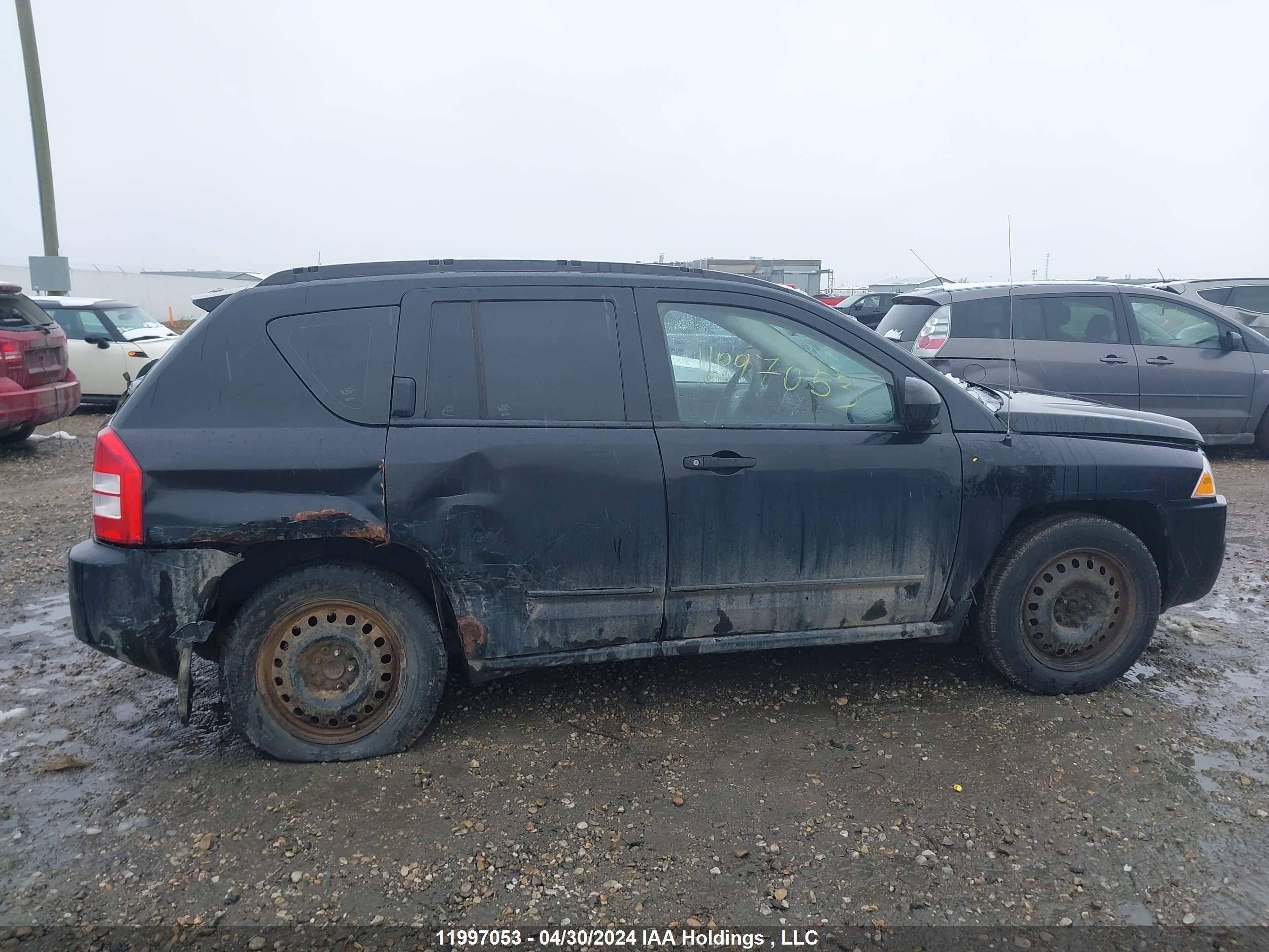 Photo 12 VIN: 1J4FT47BX9D146518 - JEEP COMPASS 